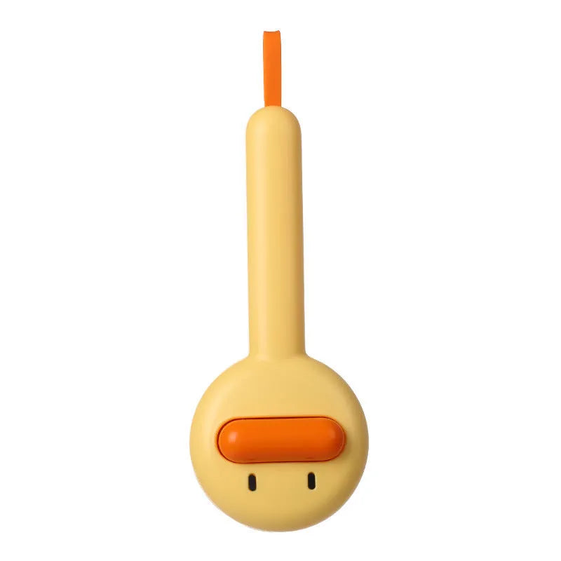 Small yellow duck-shaped comb for pet grooming with open section and needle bristles