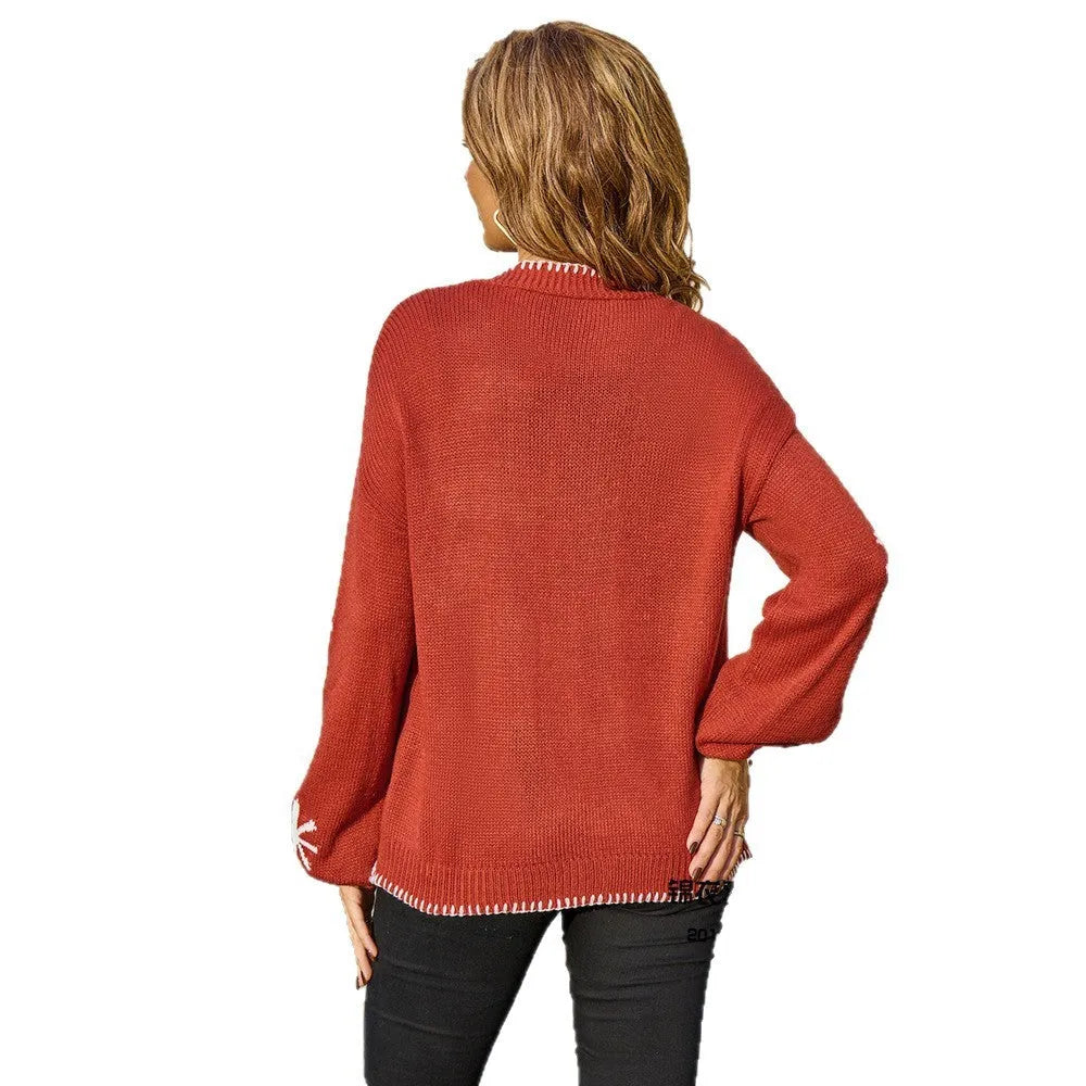 Women's jacquard knitted coat with floral pattern in beige and orange colours, loose fit cardigan design