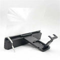 Mobile phone screen amplifier with 12-inch lens and gooseneck stand on a table, showing 3.5mm audio cable connection