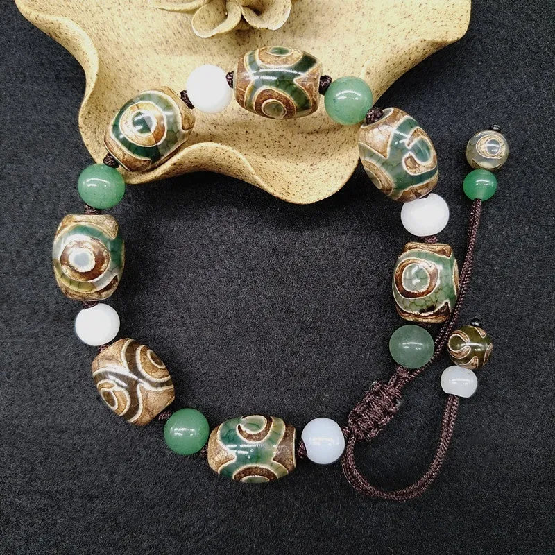 Green agate ethnic bracelet with geometric three-eye beads and adjustable closure