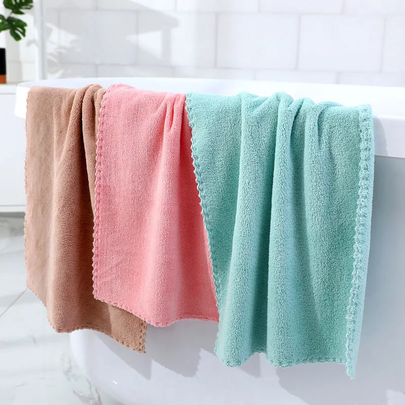 Coral fleece towel in 30x60cm and 35x75cm sizes, available in twelve colours for household use.