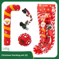 Seven sets of Christmas-themed vinyl dog toys including barbells, balls, ropes, and Santa figures.