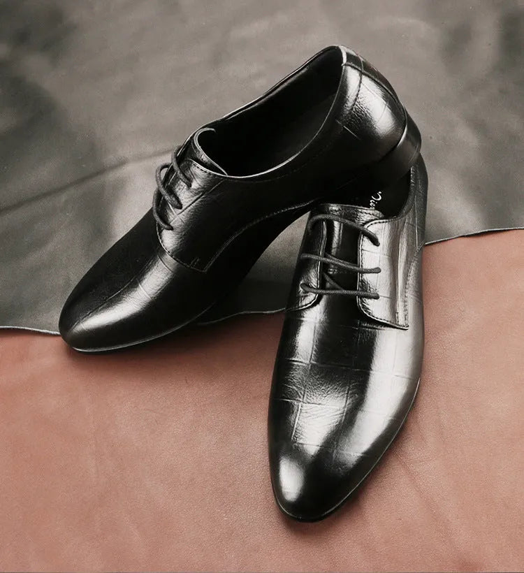 Men's black leather Derby shoes with pointed toe, handmade sewing details, and antiskid rubber sole