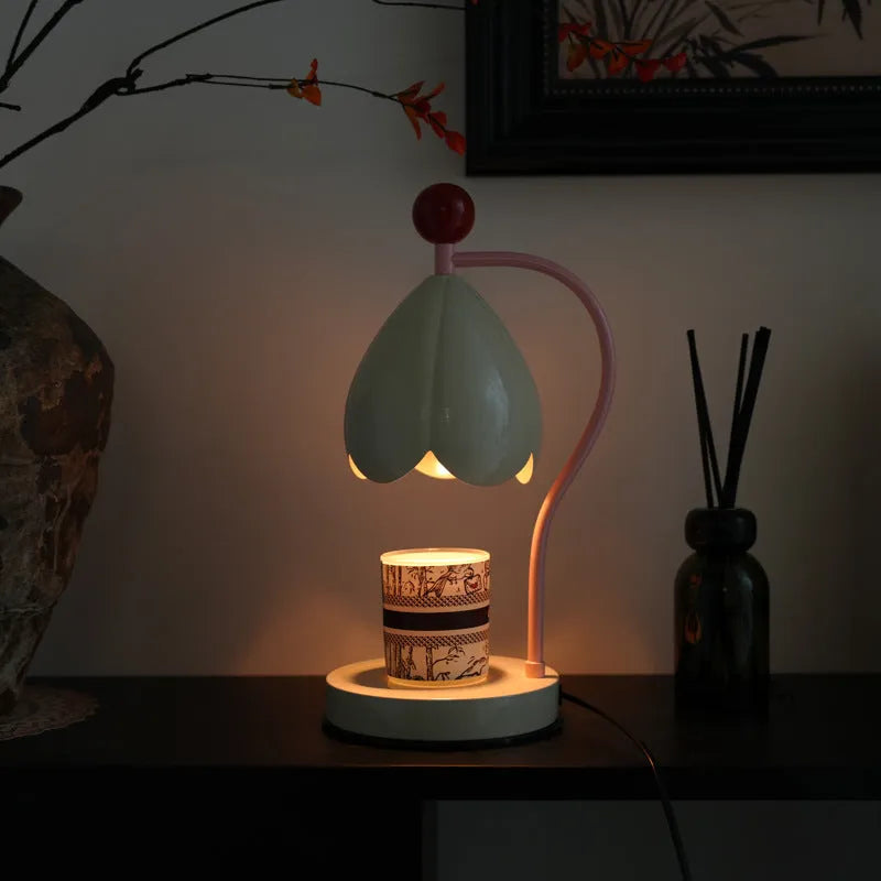 Linglan Melting Wax Lamp in cream white or dark green with metal construction and modern simplicity design