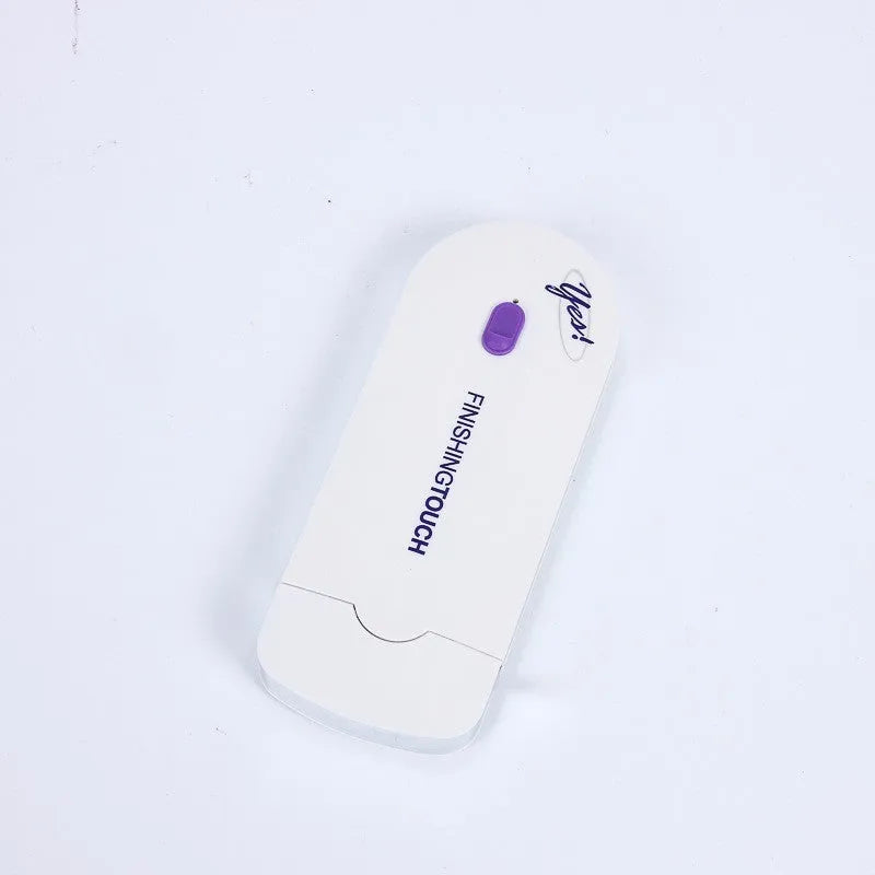 Finishing Touch electric hair removal instrument with Sensa-Light head and accessories on white background