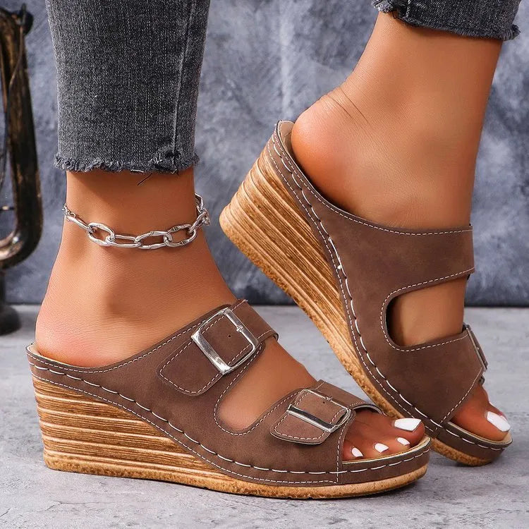 Women's wedge sole beach slippers with decorative outer buckle in creamy-white colour