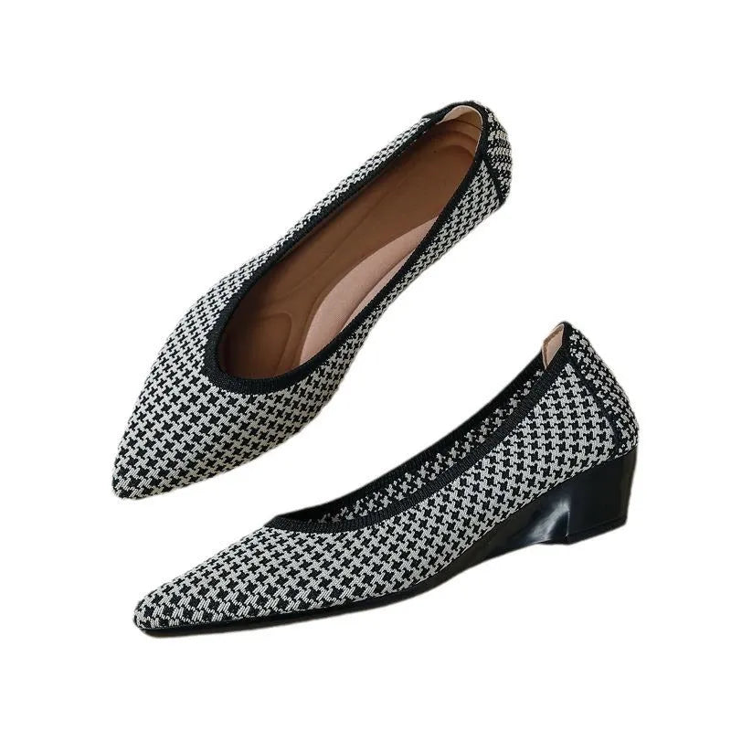 Women's low wedge pump in leopard print with mesh upper and pointed toe.