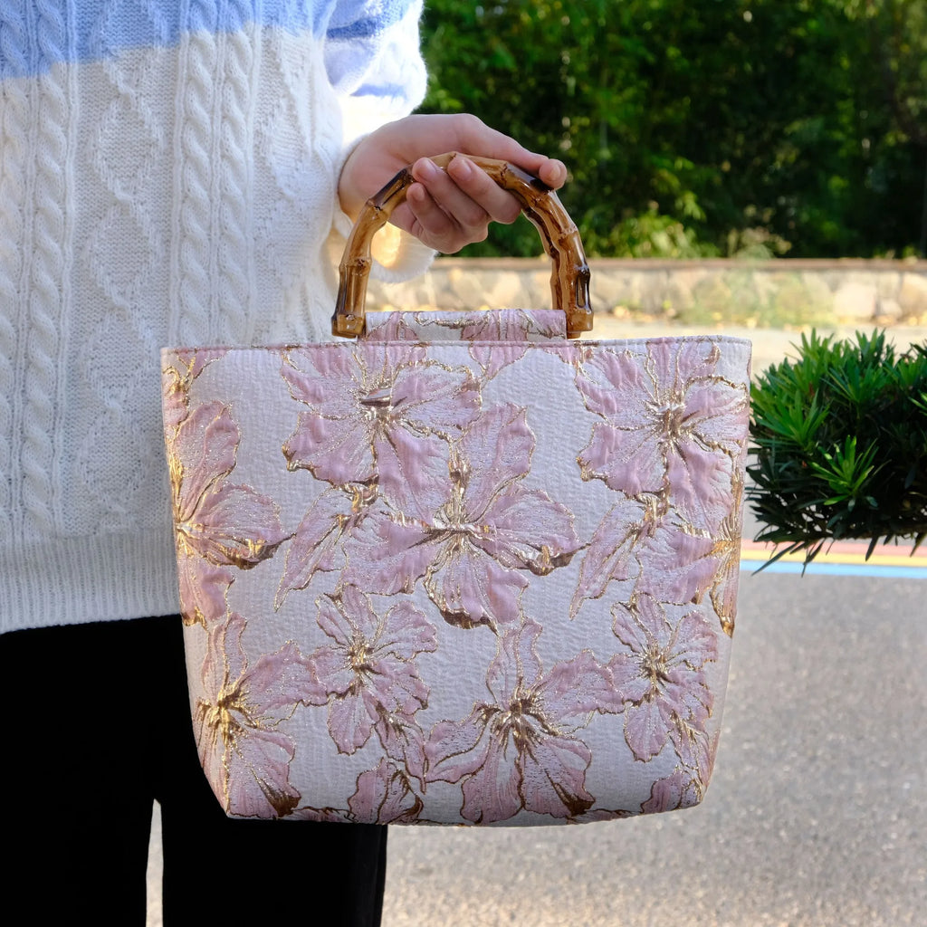 Light blue canvas shoulder bag with bronzing flower pattern and double adjustable straps