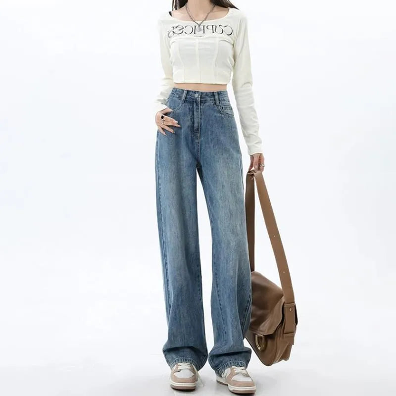 Women's retro blue wide-leg jeans with high waist and straight-leg cut on hanger