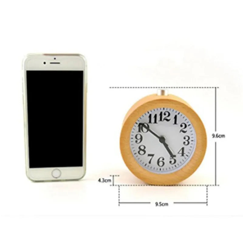 Solid beech wood circular alarm clock with silent snooze function measuring 9.5cm in diameter