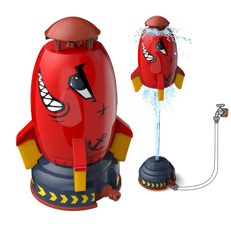 Yellow water pressure rocket launcher toy for kids outdoor garden play on a green lawn.