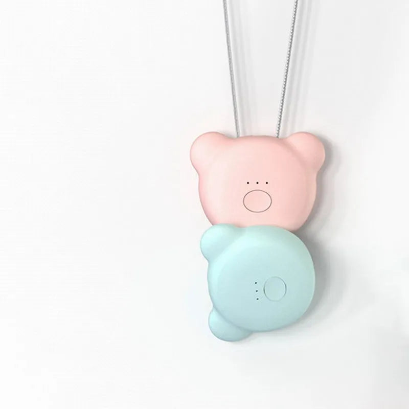 USB mini portable air purifier necklace in blue, showing compact design with USB charging port