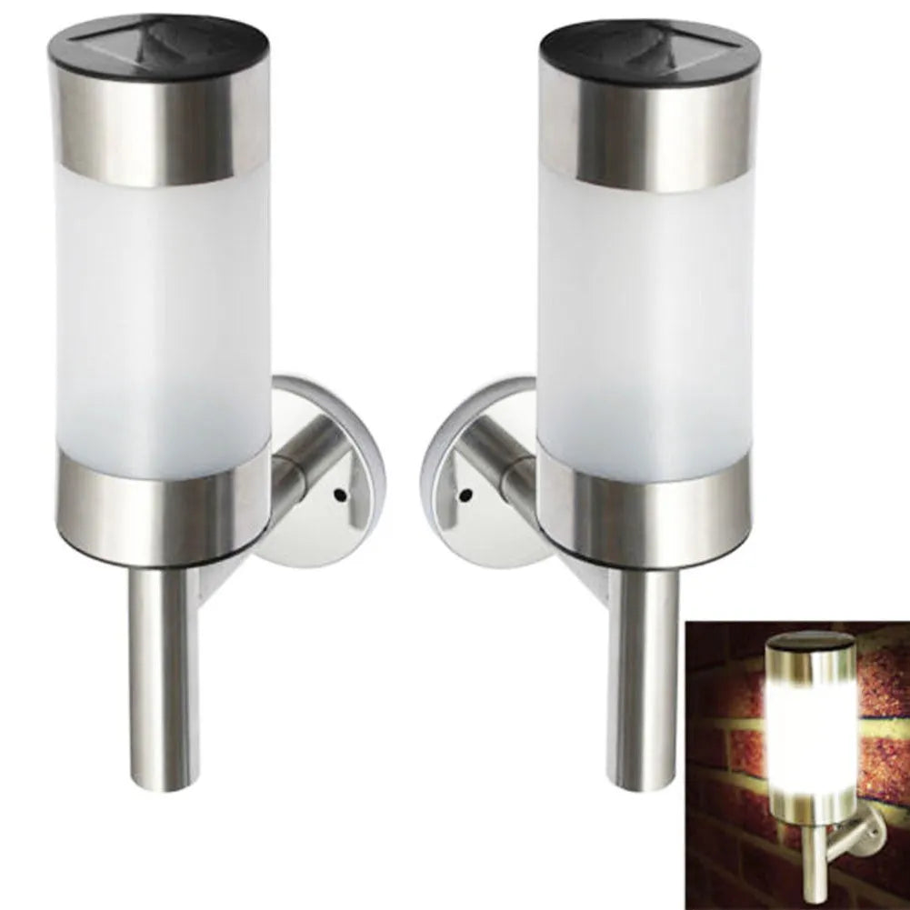 White solar-powered wall light for garden use with plastic and stainless steel construction.