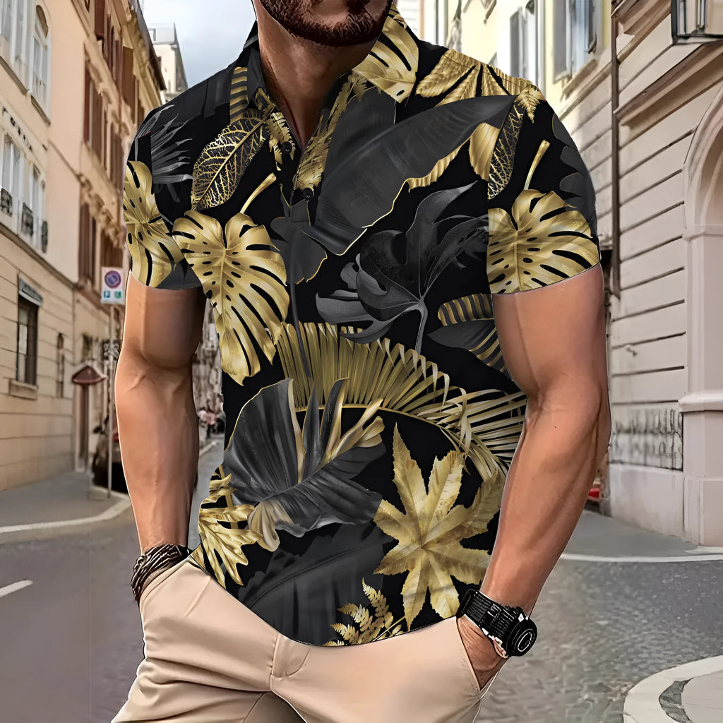 Men's gold short sleeve shirt with a large tropical leaf plant pattern print