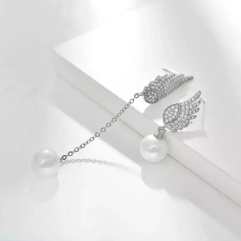 Platinum colour angel wing silver earrings with diamond treatment and gold-plated gemstone inlays