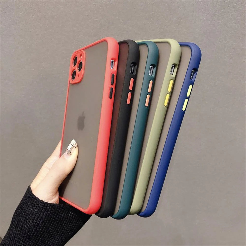 Solid colour silicone shockproof protective case for iPhone on a table.