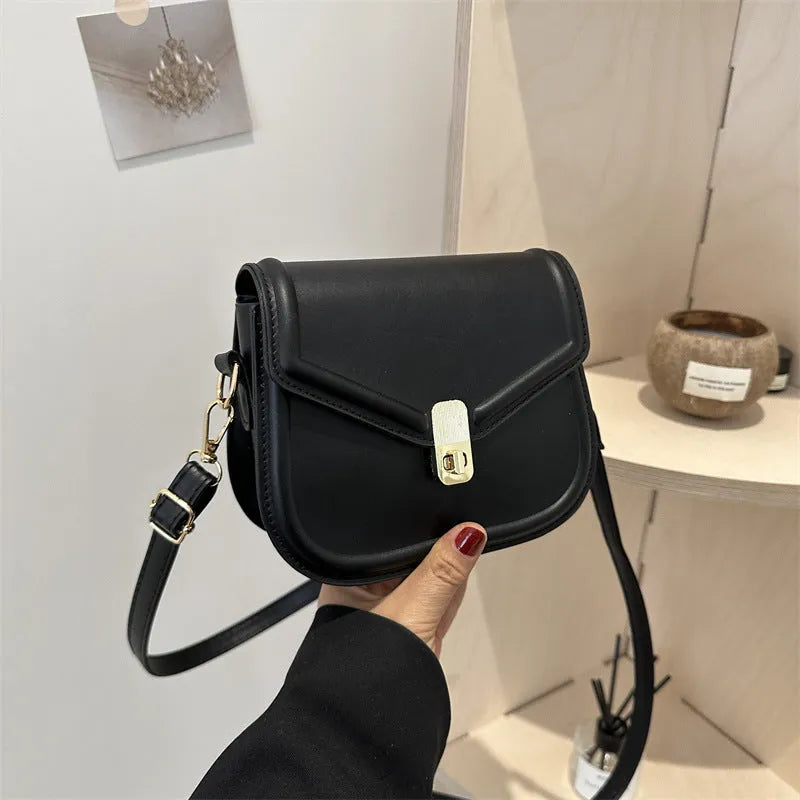 Niche Texture Shoulder Messenger Bag in clamshell design with soft PU material, shown in horizontal square shape.