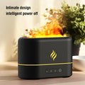 Compact black and white seven-colour flame effect aromatherapy humidifier with USB port and mist outlet.