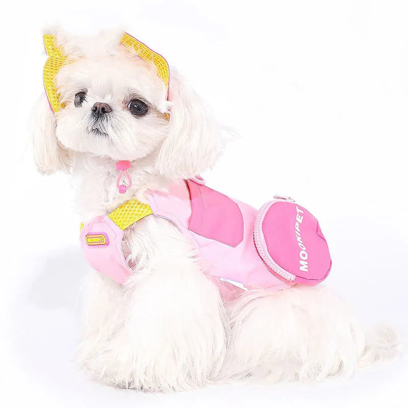 Pink dog traction vest harness for small breed dogs on a white background.