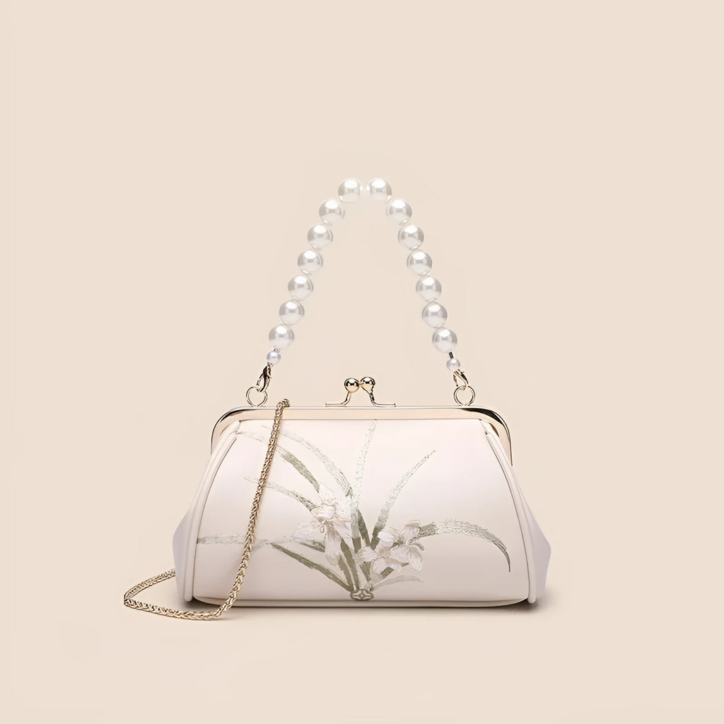 Beige women's embroidered shoulder bag with shell shape design in soft PU material