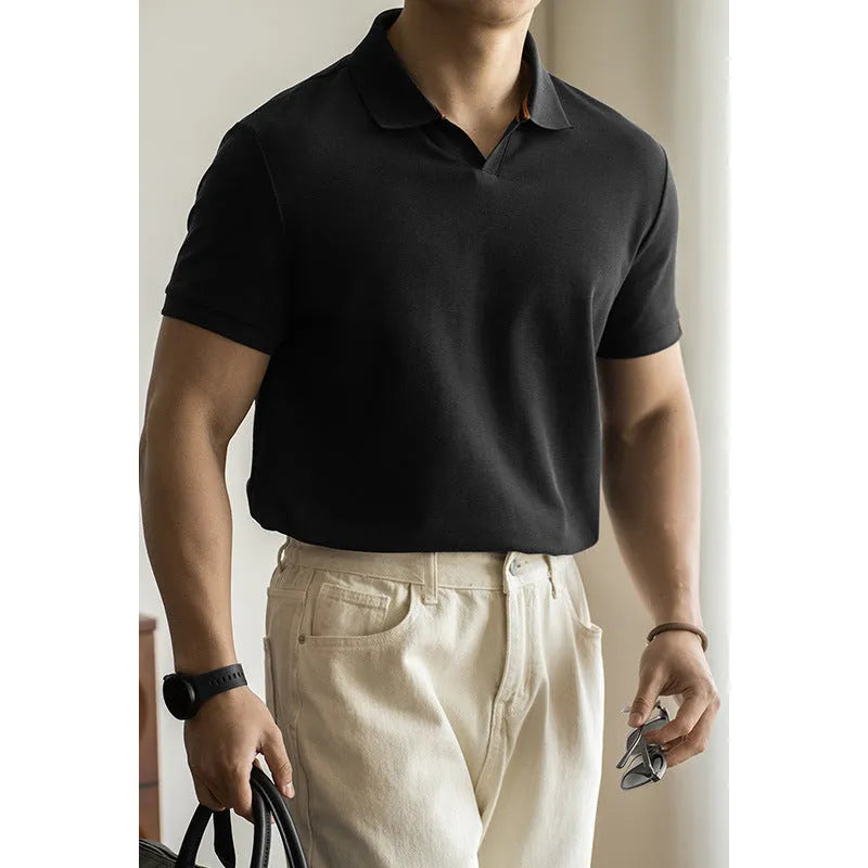 Men's blue short sleeve cotton polo shirt on a hanger, regular fit.