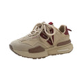 Women's black retro platform sports shoes with round toe and front lace-up design.