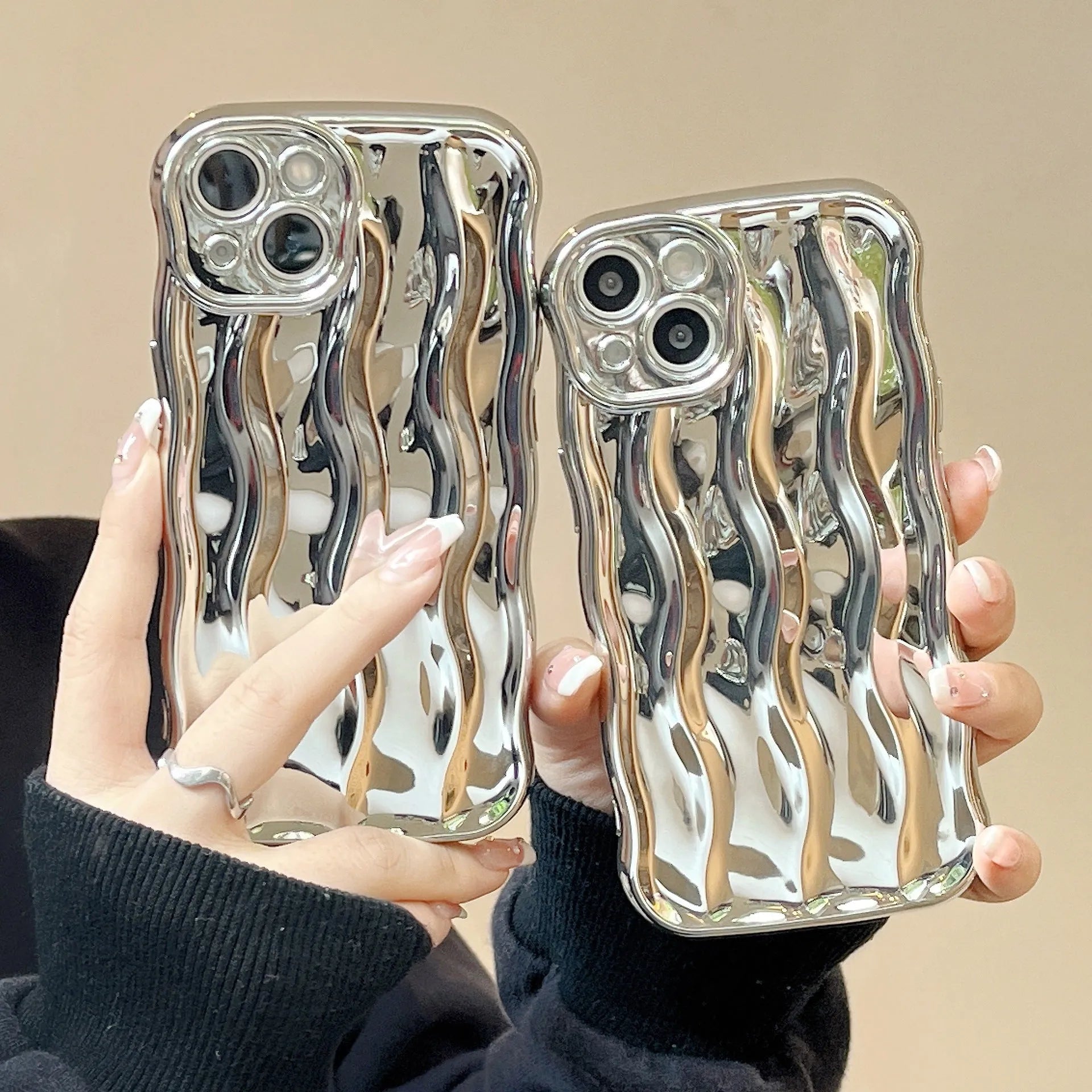 Electroplating wave stripe iPhone case showing textured back pattern and colour options including silver, purple, and black finishes