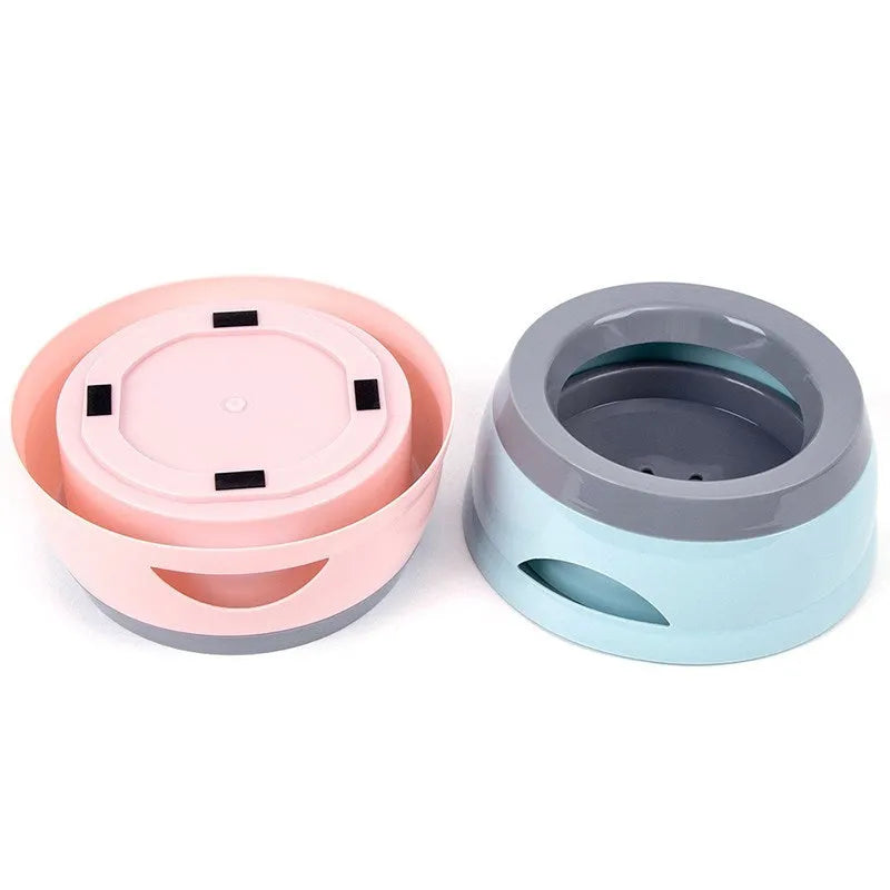 Grey pet drinking bowl with a floating ball on the water surface