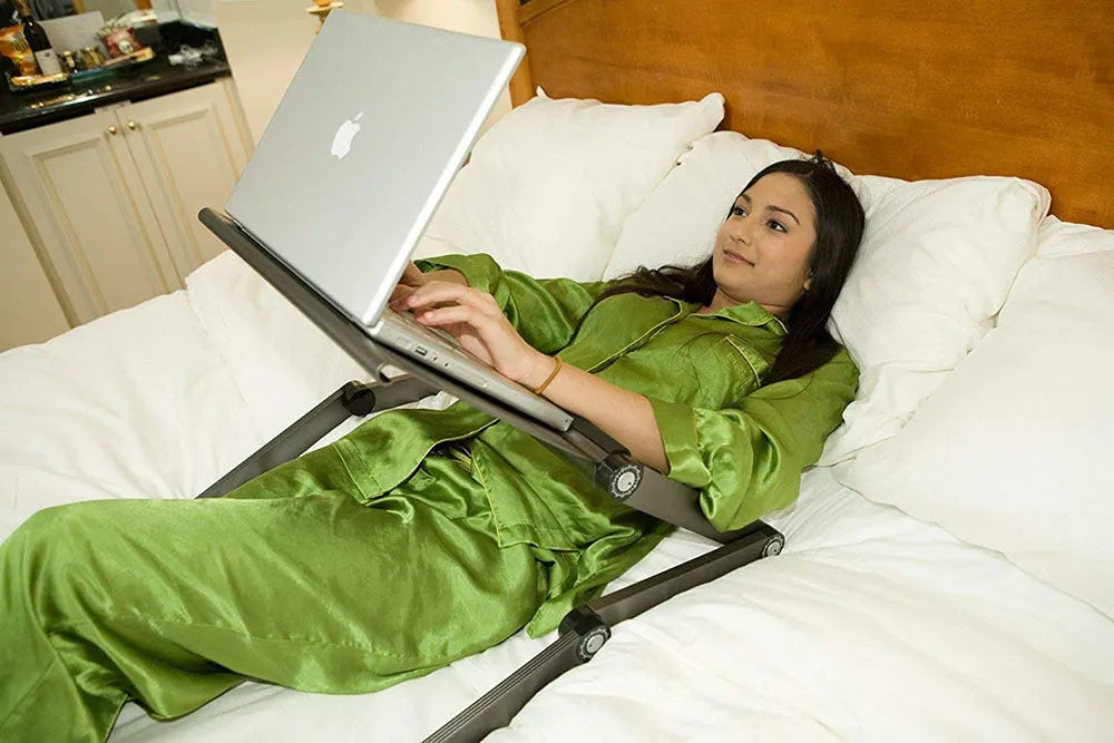 Adjustable folding laptop table stand in black with mouse panel, 42 x 26 cm surface, and built-in USB fan