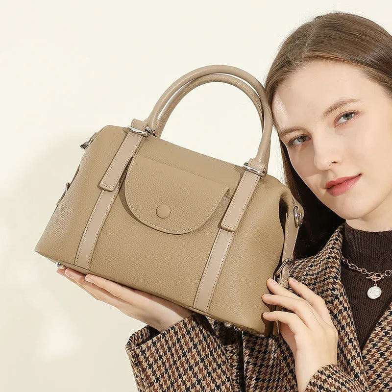 Genuine leather ladies' handbag in elephant grey with contrast stitching and lock detail, 27x12x20cm