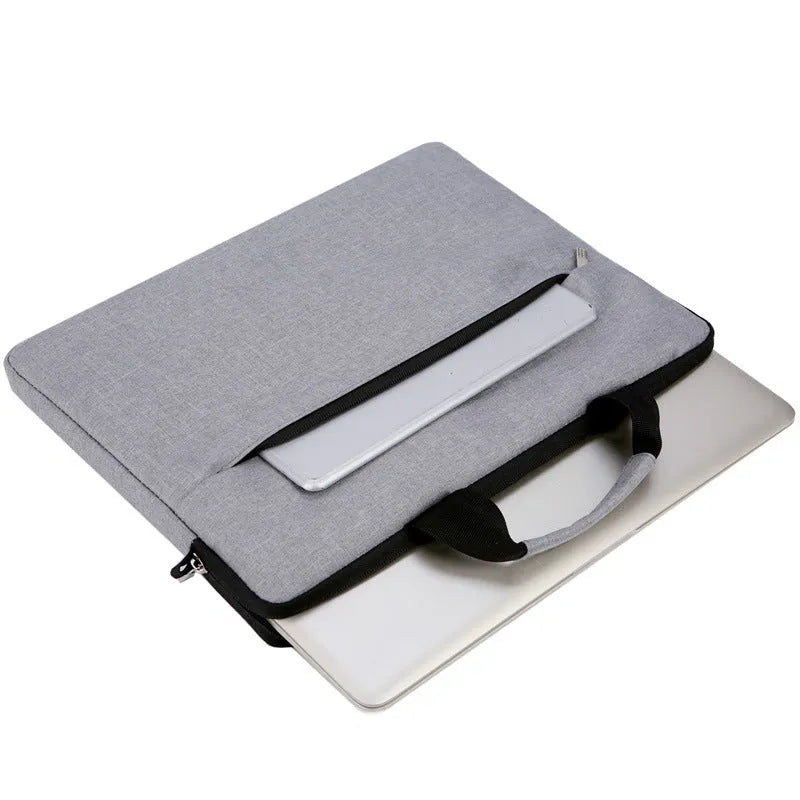 Ultra-thin Oxford cloth laptop shoulder bag for 13-inch notebook with zipper, liner, and zip pocket.