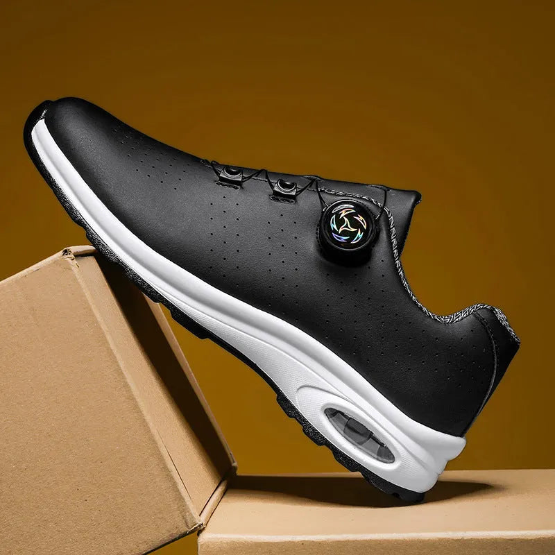 Low-top casual shoes in black with mesh upper, composite sole, and lace-up front closure on a neutral background