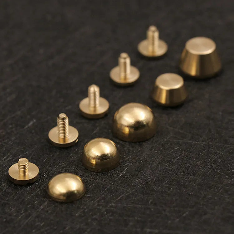 Brass decorative buckle for footwear showing 10x6mm and 12x7mm sizes in round and geometric shapes