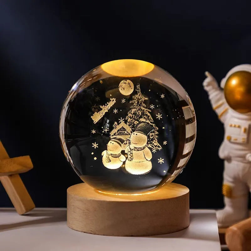 3D crystal ball night light projecting starry sky and planets from its 6cm sphere on a solid wood base.