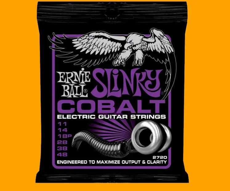 Set of nickel-plated round wound electric bass guitar strings on a white background.