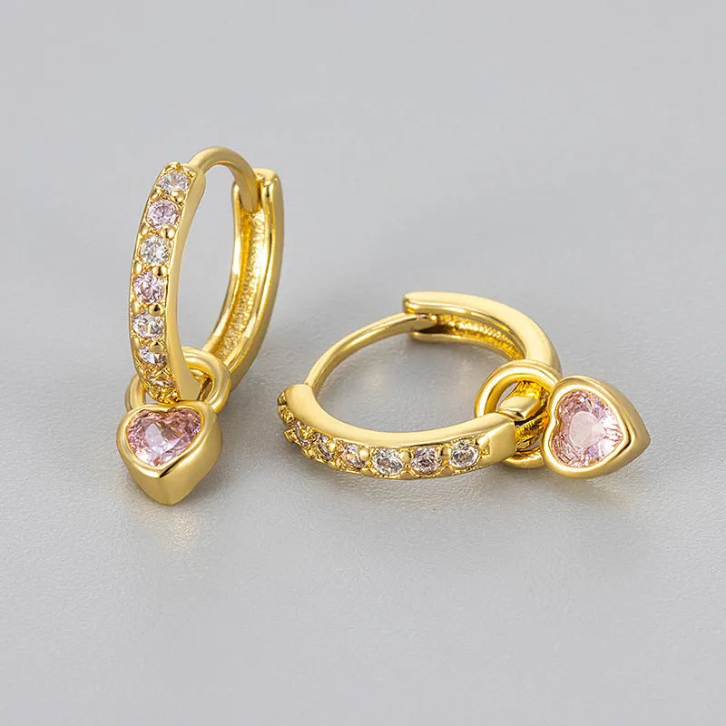 Fashion zircon earrings with heart-shaped eardrops in gold or white gold colour settings with diamond-treated gemstones