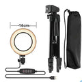 Adjustable live phone stand extended to 110 cm with phone in holder on tripod base
