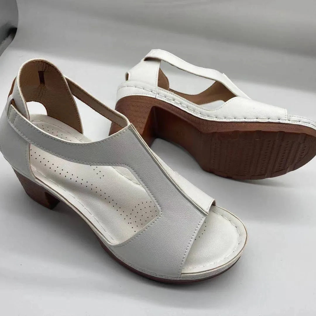 Women's plus size peep toe wedge sandals with a buckle strap in a light brown colour.