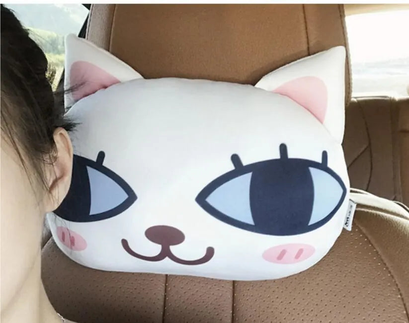 Handmade oblong car headrest pillow with printed cartoon cat design, polyester cotton cover, and PP cotton filling.