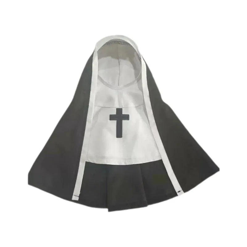 Black and white nun costume cloak on a small dog for Halloween.