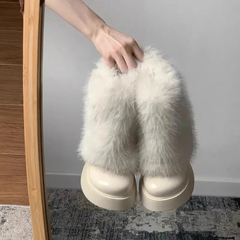 Women's low-top snow boots with artificial plush exterior and waterproof rubber sole in black colour