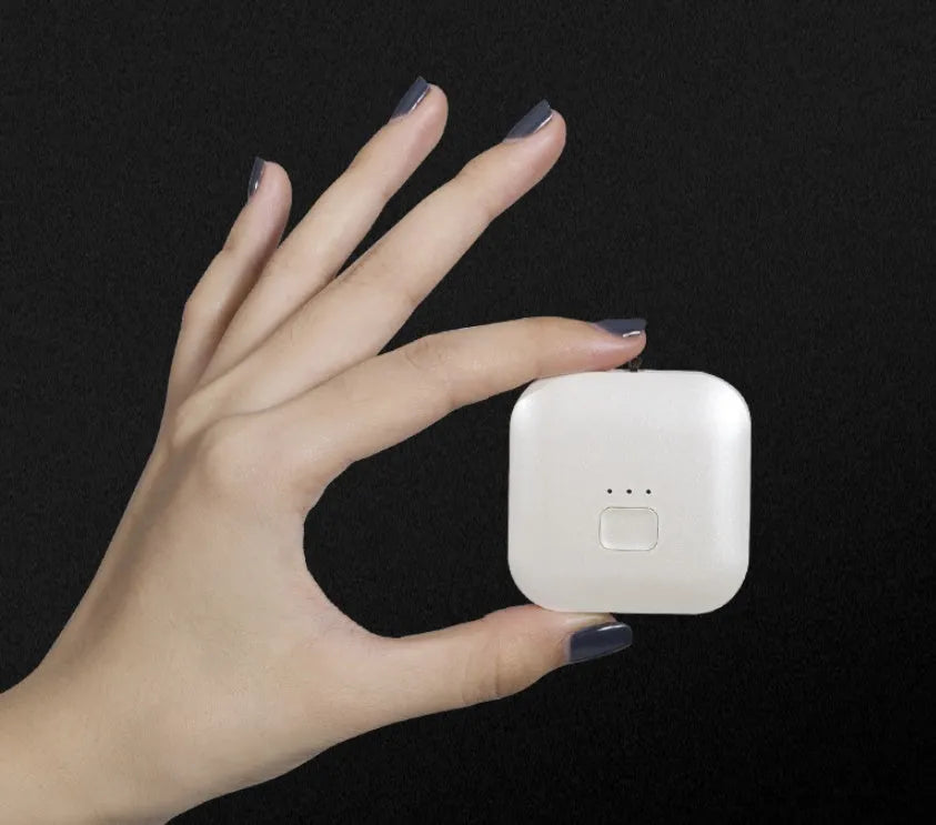 USB mini portable air purifier necklace in blue, showing compact design with USB charging port