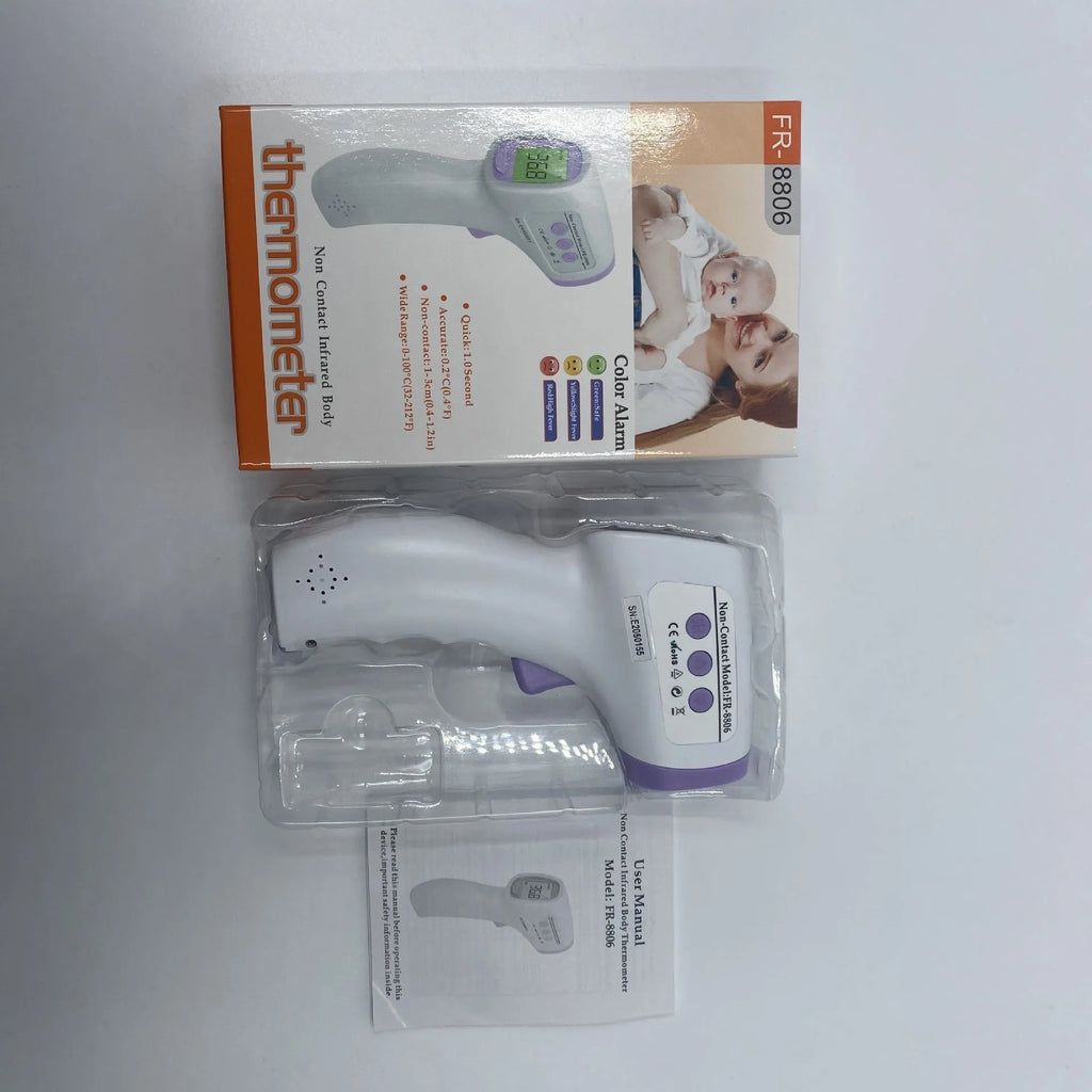 White digital thermometer displaying temperature reading on LCD screen