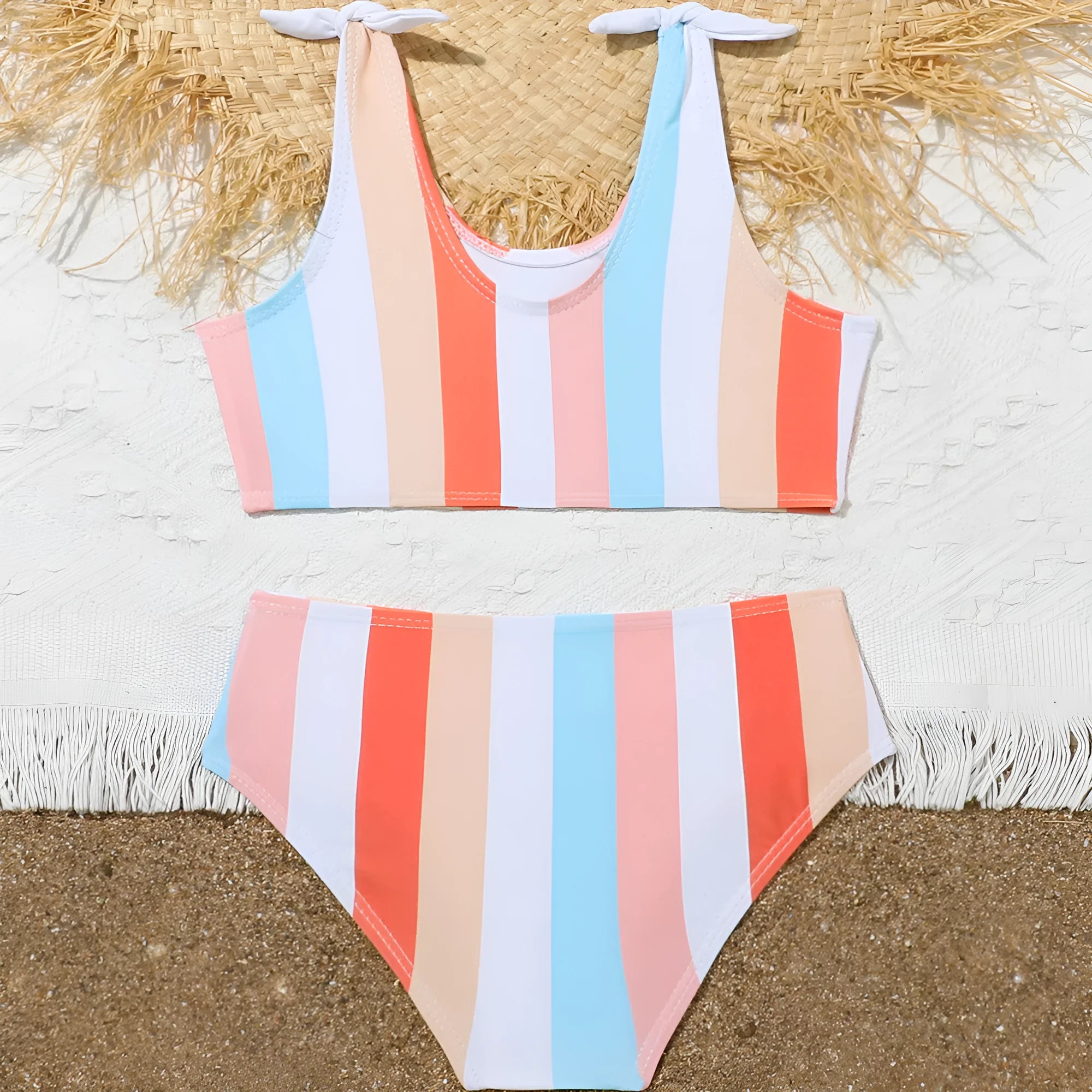 Girls plaid print swimsuit briefs with bra top, shown in multiple toddler and child sizes.