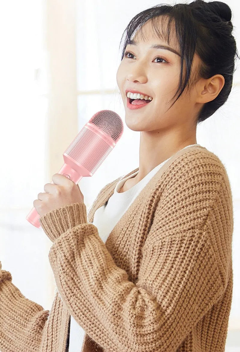 Wireless Bluetooth karaoke microphone in blue, pink, or green with 20cm length and USB charging cable