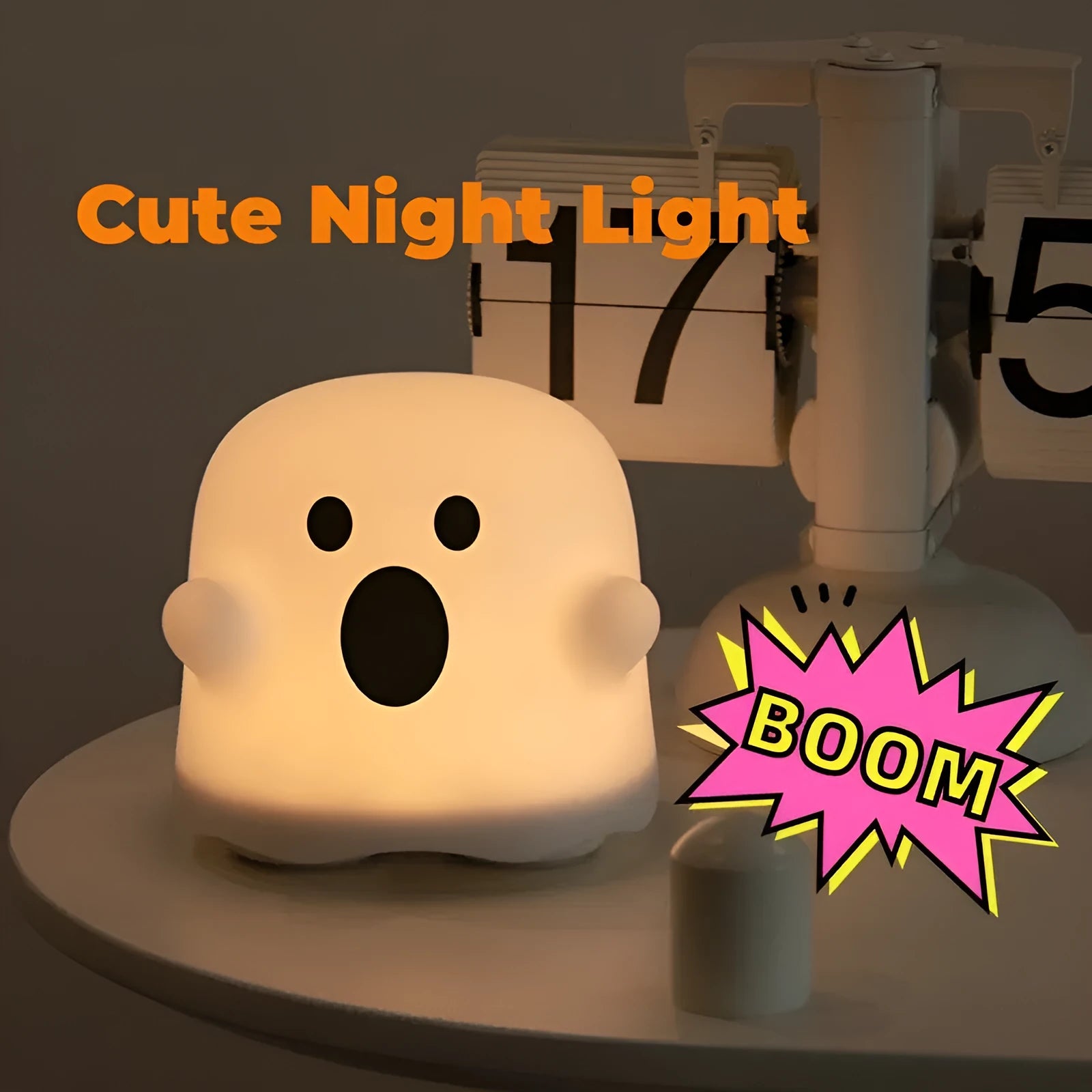 White silicone touch sensor LED night light on a bedside table.