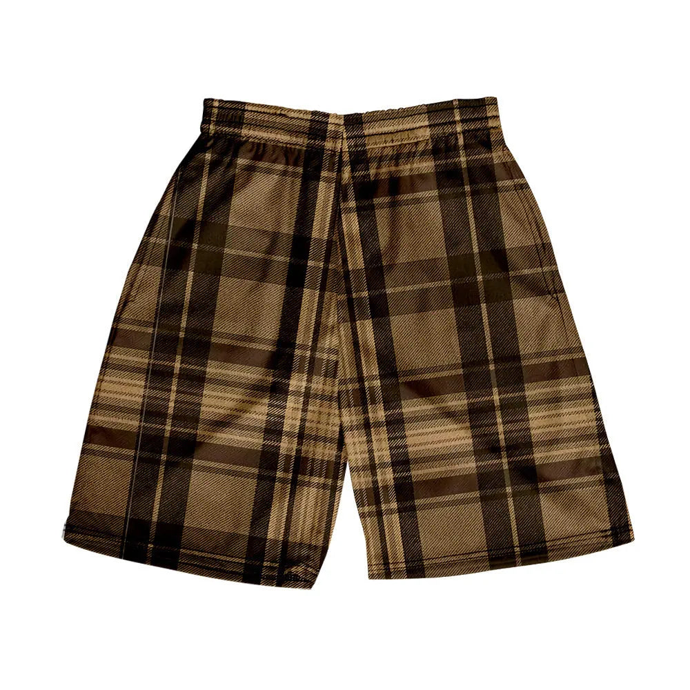 Man wearing grey plaid casual shorts with an elastic waistband, on a beach.