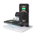 Black wireless charging station on desk with phone, watch, and headphones connected, showing 175mm size