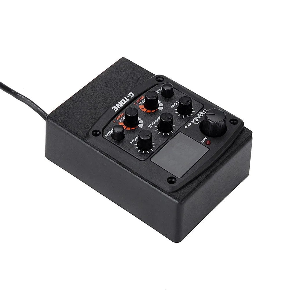 Cherub GT-6 black acoustic guitar soundhole pickup and EQ unit with control knobs.