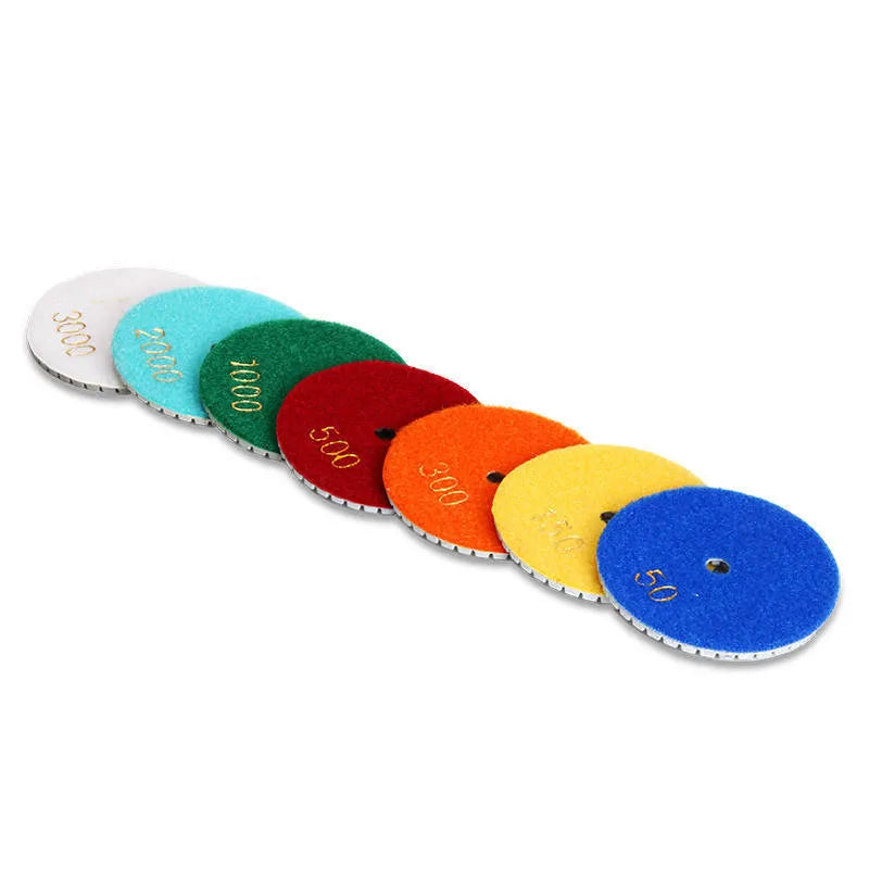 10-piece set of 80mm stone polishing pads with emery abrasive and 10mm centre holes